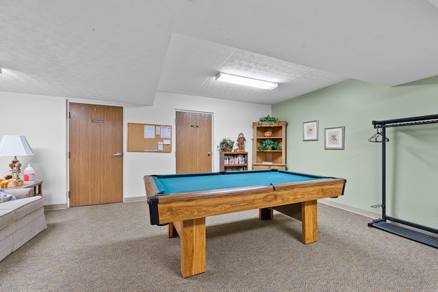 playroom with carpet, a textured ceiling, and pool table