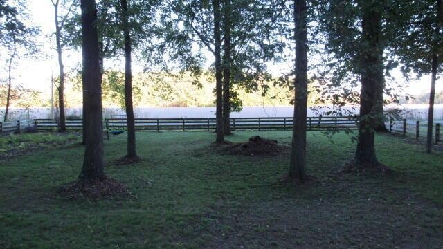 view of yard with a rural view