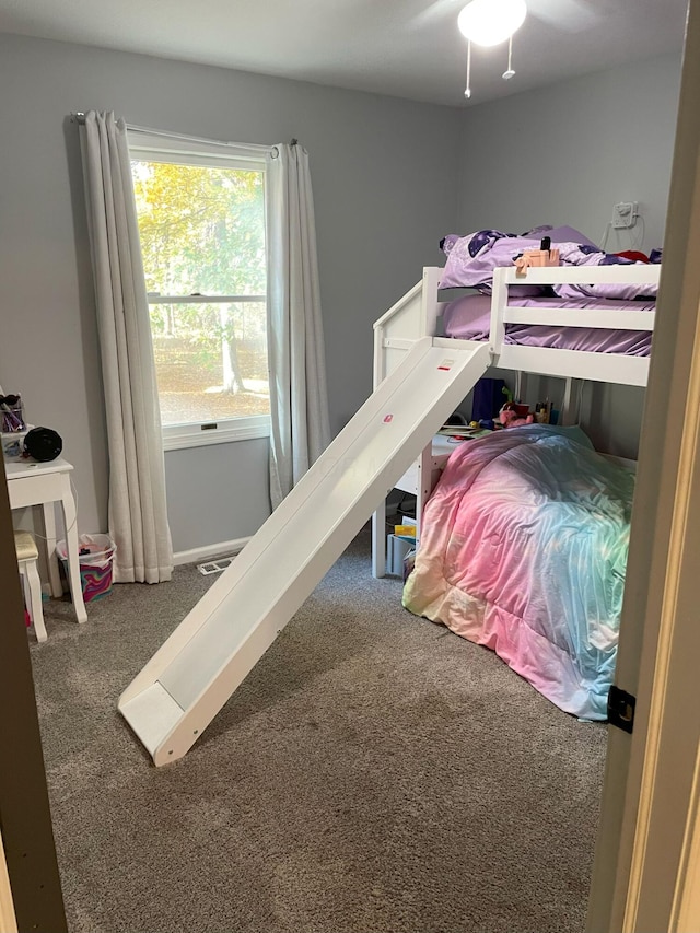 bedroom with carpet flooring and ceiling fan