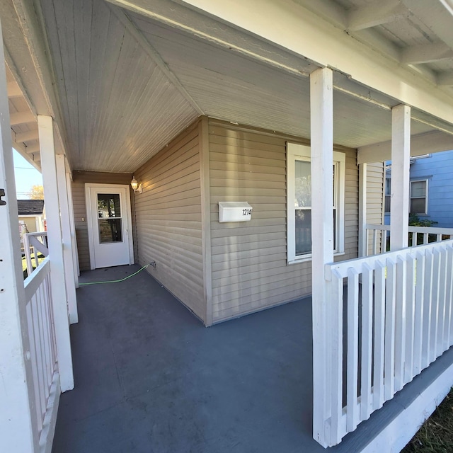 1214 W Mulberry St, Lancaster, OH 43130 - doorway to property featuring covered porch
