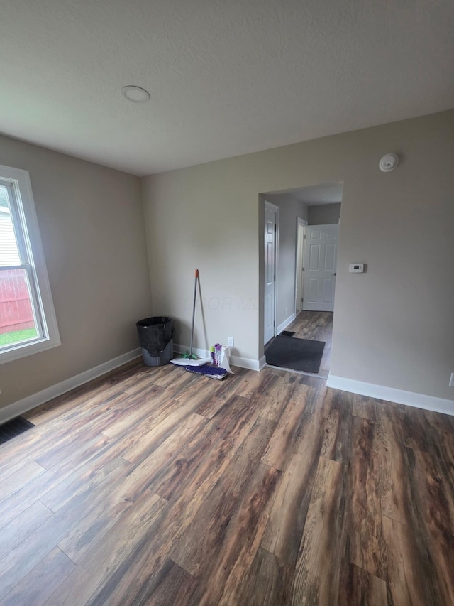 1214 W Mulberry St, Lancaster, OH 43130 - empty room featuring wood finished floors and a smoke detector