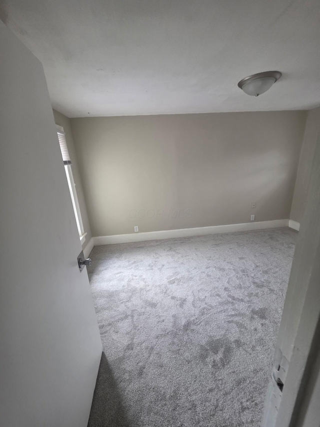 1214 W Mulberry St, Lancaster, OH 43130 - empty room with carpet and baseboards