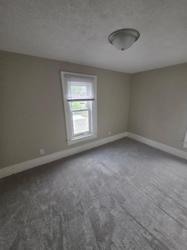 1214 W Mulberry St, Lancaster, OH 43130 - carpeted spare room with a textured ceiling