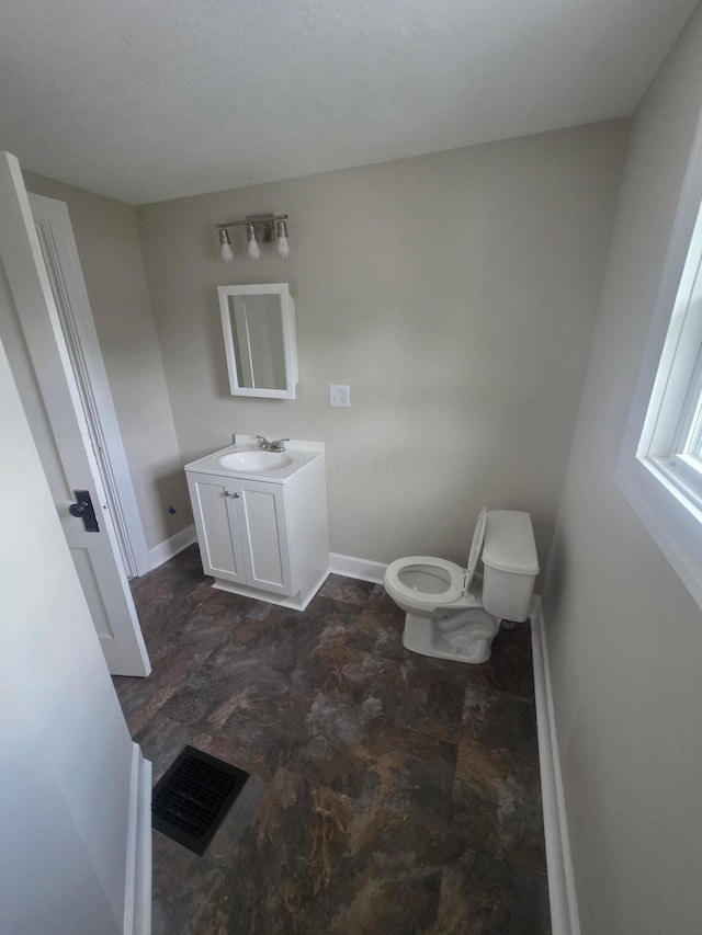 1214 W Mulberry St, Lancaster, OH 43130 - bathroom with vanity and stone finish floors