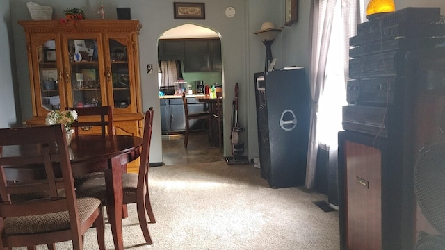 view of carpeted dining area