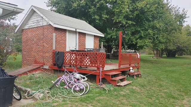 wooden deck with a yard