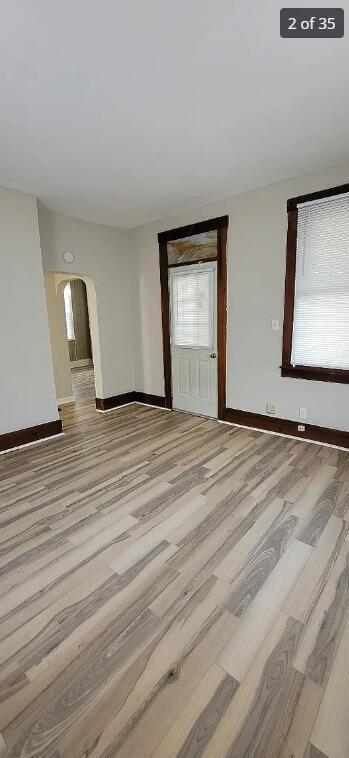 empty room with light wood-type flooring