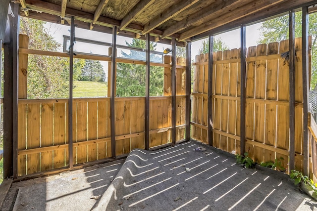 unfurnished sunroom with a healthy amount of sunlight