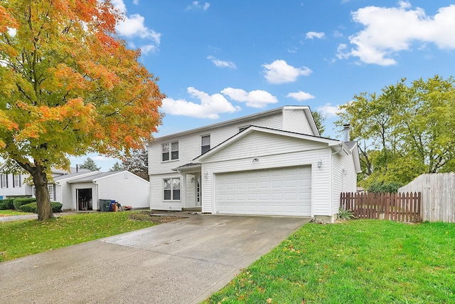 front of property with a garage, central air condition unit, and a front lawn