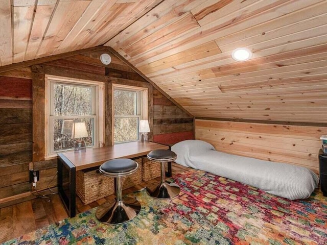 office space featuring hardwood / wood-style floors, wood ceiling, lofted ceiling, and wood walls