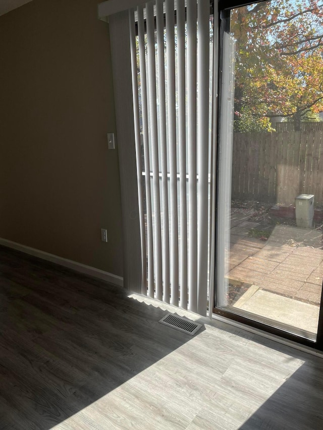 details with wood-type flooring