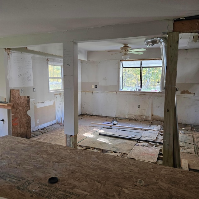 interior space featuring plenty of natural light and ceiling fan