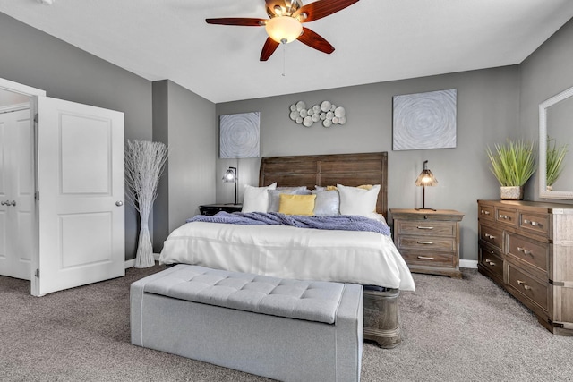 bedroom with ceiling fan and carpet floors