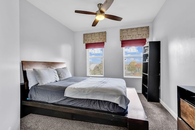 bedroom featuring carpet, ceiling fan, and lofted ceiling