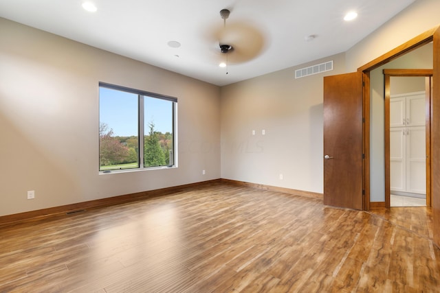 empty room with light wood-type flooring