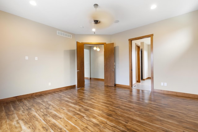 17311 Gambier Rd, Mount Vernon, OH 43050 - empty room with wood finished floors and recessed lighting