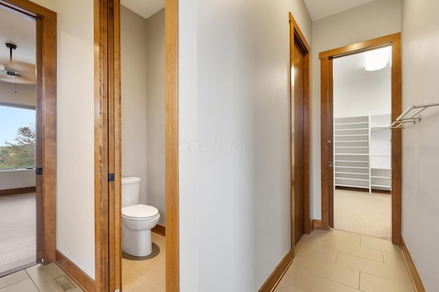 hallway featuring light tile patterned floors