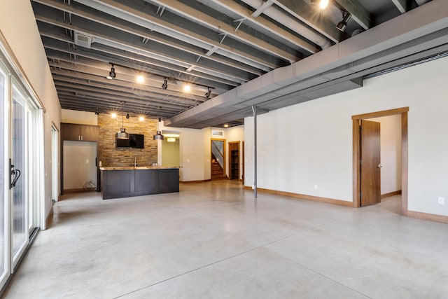 17311 Gambier Rd, Mount Vernon, OH 43050 - basement featuring baseboards and stairway