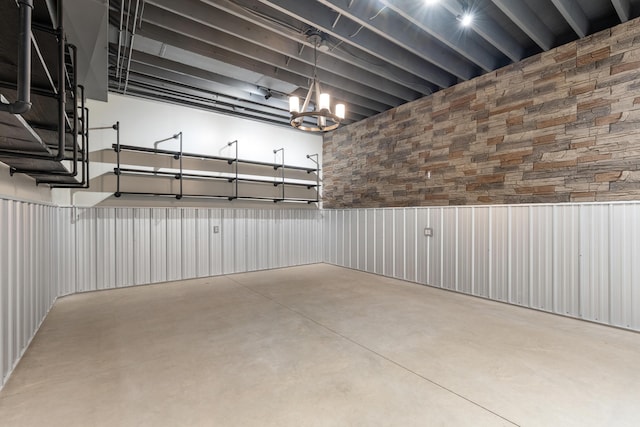17311 Gambier Rd, Mount Vernon, OH 43050 - basement featuring a chandelier and a garage