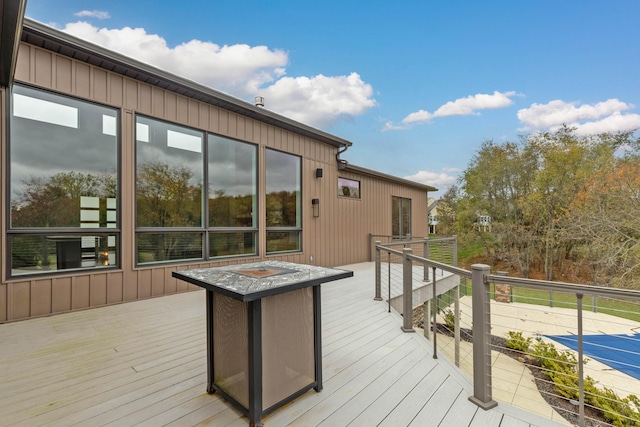 deck featuring a fire pit