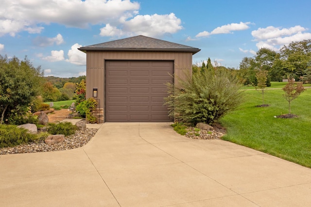 garage with a yard