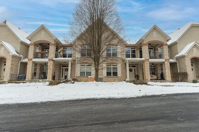 view of front of home with a balcony