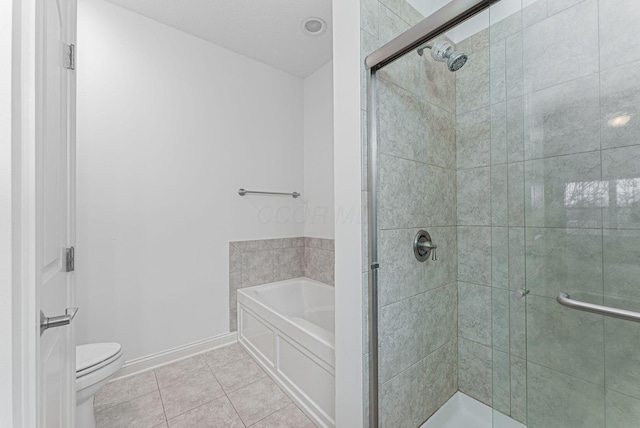 bathroom featuring tile patterned floors, toilet, and independent shower and bath