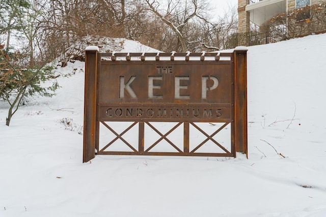 view of snow covered gate