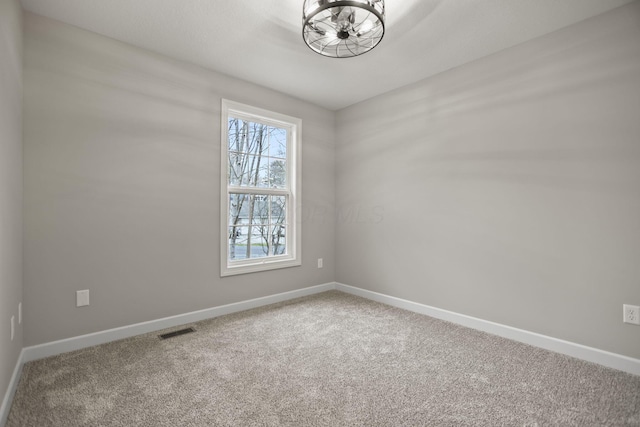 unfurnished room with carpet