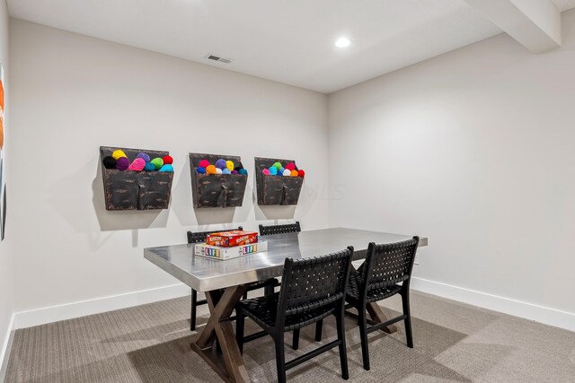 dining space featuring carpet floors