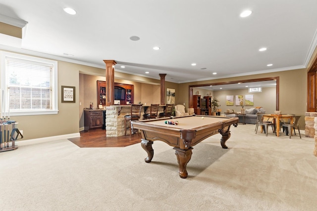 playroom with decorative columns, ornamental molding, indoor bar, and light colored carpet