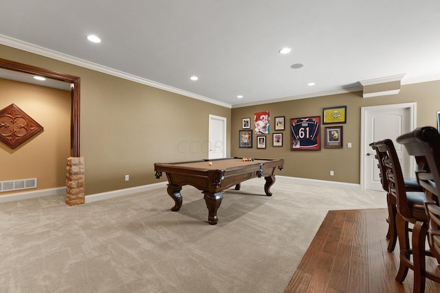 rec room with light colored carpet, ornamental molding, and pool table