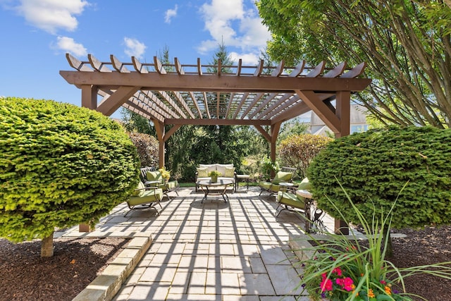 view of patio / terrace featuring an outdoor hangout area and a pergola