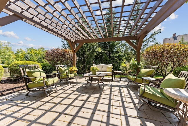 view of patio / terrace with outdoor lounge area and a pergola