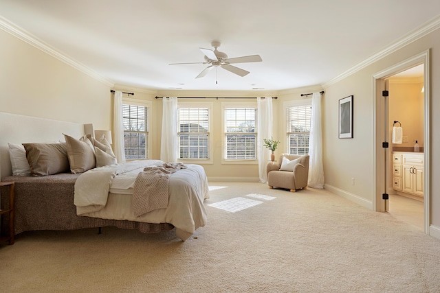 carpeted bedroom featuring multiple windows, crown molding, ceiling fan, and ensuite bath