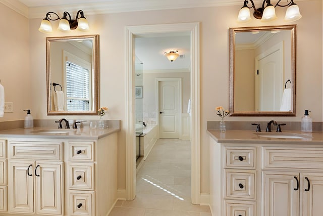 bathroom with ornamental molding, tile patterned floors, and vanity