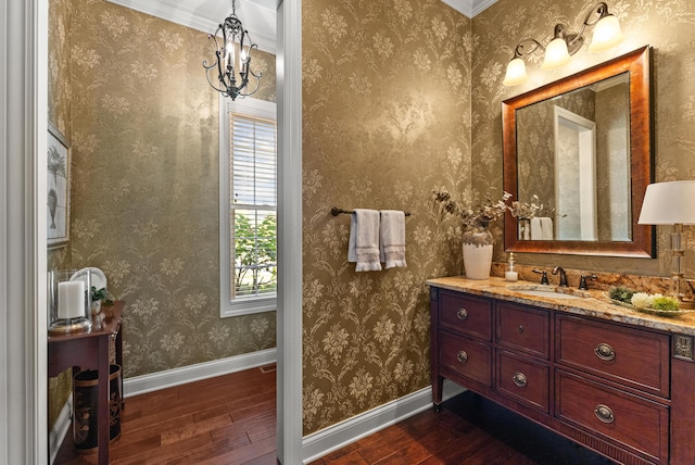 bathroom with hardwood / wood-style flooring and vanity