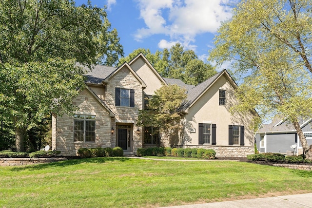 view of front of home featuring a front lawn