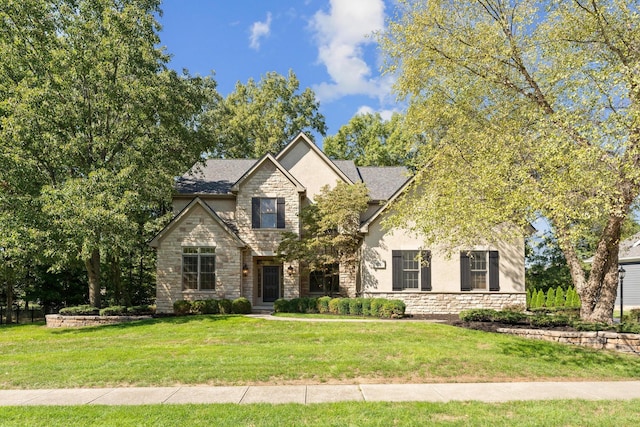 view of front of home with a front yard