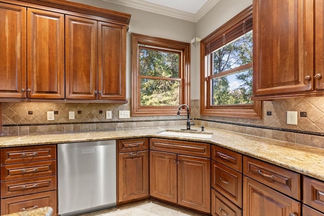 kitchen with dishwasher, backsplash, sink, ornamental molding, and light stone counters