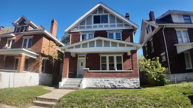 view of front of property with a front lawn