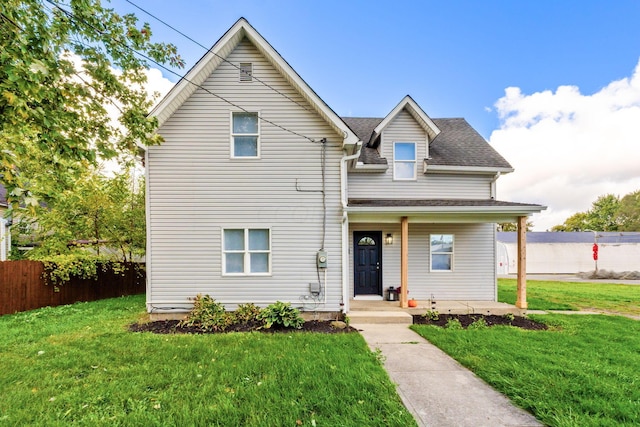 view of front property featuring a front lawn