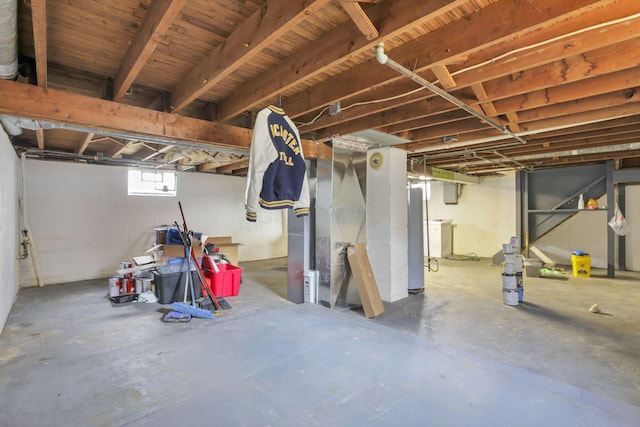 basement featuring water heater