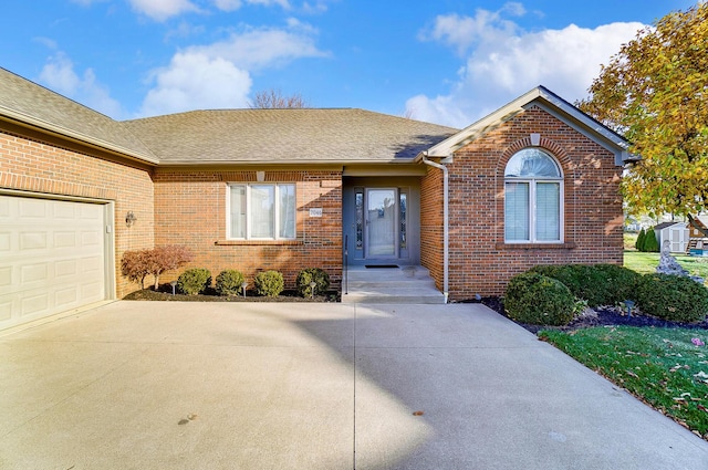 single story home featuring a garage