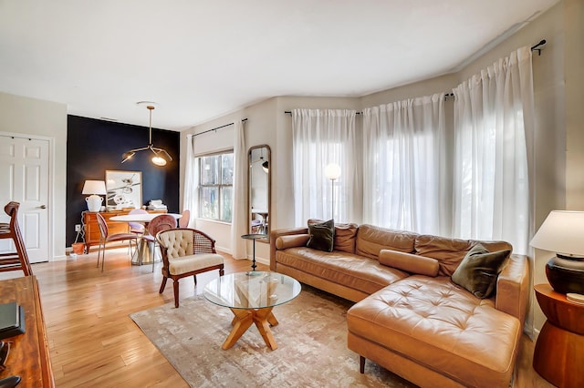 living room with light hardwood / wood-style flooring