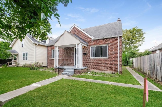 view of front facade with a front yard