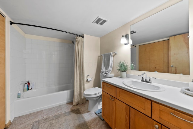 full bathroom with vanity, toilet, and shower / tub combo