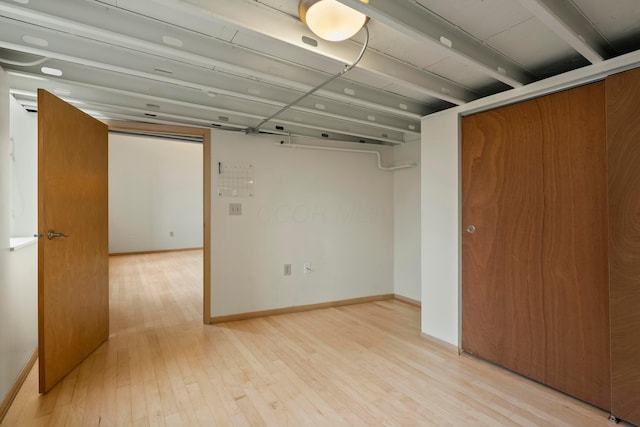 empty room with light wood-type flooring