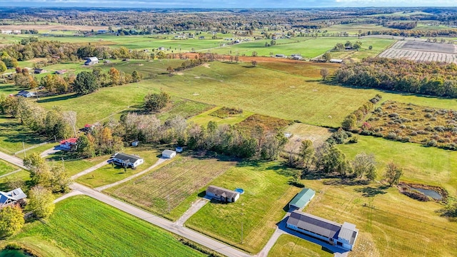 birds eye view of property featuring a rural view