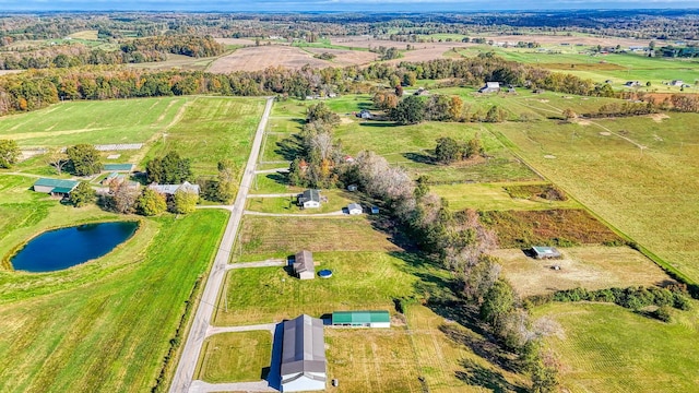 drone / aerial view with a water view and a rural view